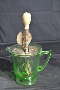lot 97 image: Uranium Hand MixerMeasuring Cup