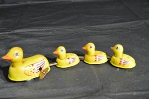 lot 116 image: Vintage Duck Pull-Along Toy Set - 4 Yellow Rubber Ducks on Metal Rail