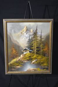 lot 227 image: Alpine Landscape Painting - Mountain Cabin by River, Framed Canvas Art