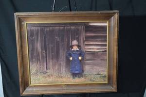 lot 238 image: Framed Photograph - Child in Navy Blue Coat with Hat (Wood Frame)