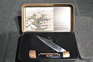 lot 31 image: National Rifle Association US Army Tribute Knife - This We Will Defend - Est. 1775
