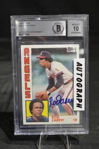 lot 35 image: Topps 1984 Rod Carew Angels Autographed Baseball Card - Beckett Authenticated 10