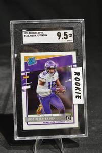 lot 38 image: 2020 Donruss Optic Justin Jefferson RC - Minnesota Vikings - Graded 9.5 SGC