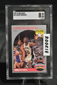 lot 54 image: David Robinson 1990-91 NBA Hoops Rookie Card #270 - SGC 8 NMMT