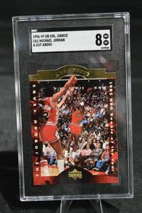 lot 60 image: Michael Jordan 1996-97 Upper Deck Collectors Choice A Cut Above Card - SGC 8 NM-MT