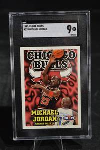 lot 68 image: Michael Jordan 1997-98 NBA Hoops #220 Card - SGC 9 Mint