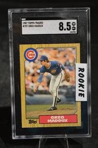 lot 184 image: Topps Traded Greg Maddux RC #70 - SGC 8.5 NM-MT