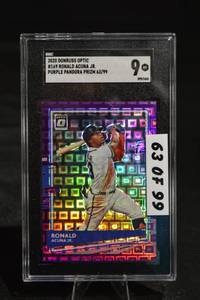 lot 291 image: Ronald Acuna Jr. Donruss Optic Purple Pandora Prizm 6399 SGC 9 MT