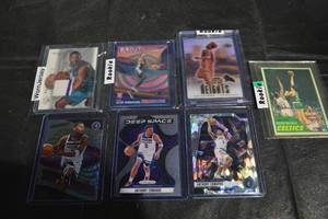 lot 301 image: Basketball Card Lot - Wembanyama RC Jersey, Edwards RC, McHale Celtics RC (Lot of 7)