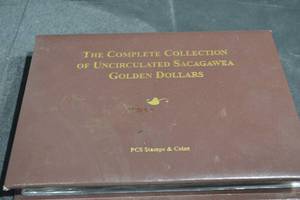 lot 324 image: PCS Stamps & Coins Sacagawea Golden Dollars Complete Collection 2001-2011 Binder