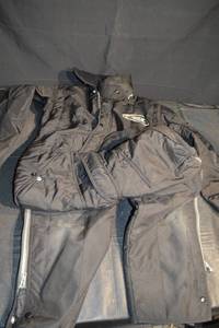 lot 351 image: Vintage Arctic Cat Snowmobile Jacket - Black Quilted Insulated Winter Coat