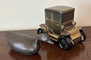 lot 476R image: K - Northwestern National Bank Car Coin Bank and Metal Duck Sculpture