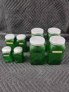 lot 54 image: Green Glass Canister Jars with Lids - Coconut, Nuts, and Brown Sugar Labels