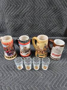 lot 55 image: Oktoberfest Stein Lot - 4 Ceramic Steins  5 Killians Irish Red Shot Glasses
