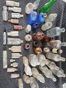 lot 58 image: Antique Glass Bottle Lot - Cobalt Blue Embossed Medicine Bottle with Assorted Clear & Amber Bottles