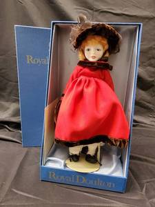 lot 84 image: Royal Doulton Porcelain Dolls - Red Dress Boxed Doll & Mint Green Dress Boxed Doll