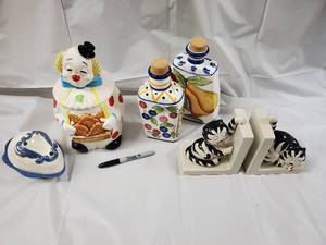 lot 154 image: Vintage Ceramic Clown Cookie Jar, Fruit Bottle Decanters, Cat Figurines & Heart Dish - 6-Piece Lot