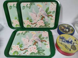 lot 62 image: Three Metal Cockatiel Trays & Two Metal TinsLids