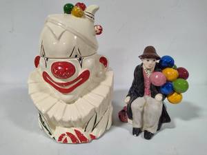 lot 108 image: McCoy 1940s Clown Cookie Jar & Balloon Man Figurine