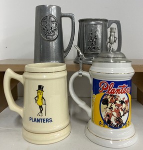 lot 46 image: Lot of Planters Peanuts Mr. Peanut Beer Steins