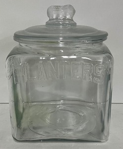 lot 93 image: Planters Peanuts Square Glass Jar Embossed Display Jar 1930s-40s