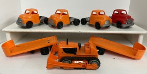 lot 180 image: Hubley Kiddie Trucks and Trailers and Marx Toys Baby Bulldozer 1950-1960s