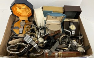 lot 242 image: Wrist Watch and Parts Lot Calculator Wristwatches from the 1980s