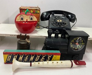 lot 277 image: Vintage Apple Bank, Train Clock Bell Bank
