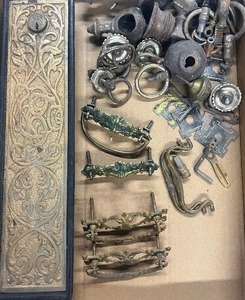lot 297 image: Vintage Brass and Cast Iron Door Plate Antique Drawer Pulls Brass Lot Green Man face Victorian and Art Nouveau hardware.
