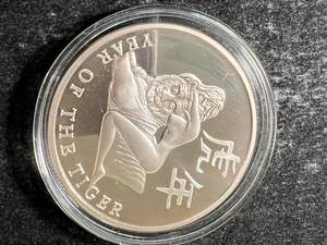 lot 10 image: 1 TROY OZ .999 FINE SILVER CHINESE YEAR OF THE TIGER ROUND IN AIRTITE
