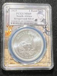 lot 20 image: 2025 S. AFRICAN KRUGERRAND 1 TROY OZ FINE SILVER PCGS MS69