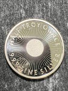 lot 23 image: HALF TROY OZ .999 FINE SILVER SUNSHINE MINTING ROUND