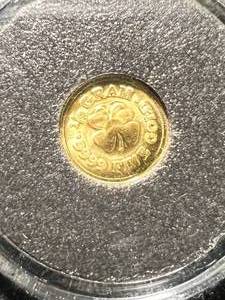 lot 43 image: HALF GRAM .9999 FINE GOLD MONARCH METALS ROUND IN AIRTITE
