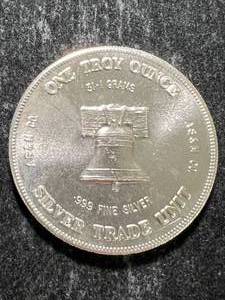 lot 44 image: 1 TROY OZ .999 FINE SILVER TRADE UNIT ROUND