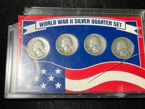 lot 70 image: WORLD WAR II 4 COIN SILVER QUARTER SET