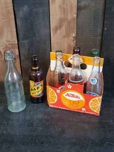 lot 27 image: Group of rare Soda Pop Bottles and Nesbitt 6 Pack Carry Case