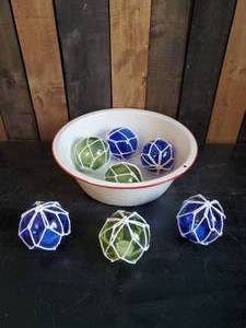 lot 63 image: Seven Colored glass Fishnet Floats with Tea Lights inside w Antique Large Porcelain Wash Tub