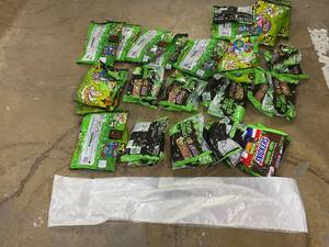 lot 205 image: LOT OF 34 Warheads, Twix & Snickers (Ghoulish Green)