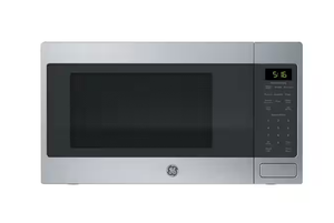 lot 229 image: GE 1.6 Cu. Ft. Countertop Microwave Oven (Minor Transit Damage, See Photos)