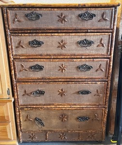 lot 5 image: Vintage Bamboo-Style Tall Dresser with Textured Drawers and Decorative Accents