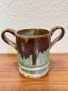 lot 93 image: Handmade Studio Pottery Two-Handled Mug with Brown and Green Glaze