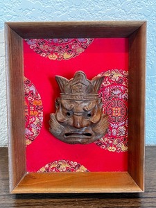 lot 101 image: Framed Hand-Carved Wooden Asian Mask Wall Art
