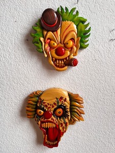 lot 153 image: Set of 2 Signed Hand-Carved Colorful Clown Wall Masks