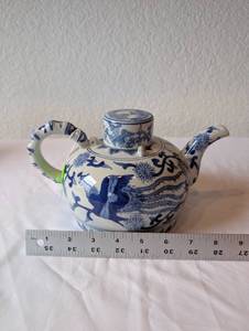 lot 12 image: Blue and White Porcelain Teapot with Dragon Motif