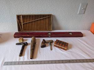 lot 18 image: Vintage Wooden Tool and Decor Collection with Level, Sorting Tray, and Carved Box
