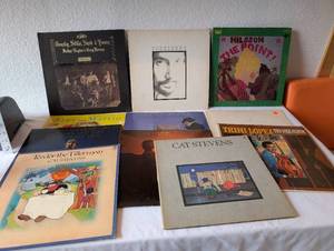 lot 40 image: Lot of 10 Vintage Vinyl Records including Cat Stevens, Foreigner, and More