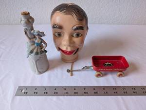 lot 55 image: Vintage Collectibles Lot Porcelain Ballerina Bottle, Ventriloquist Dummy Head, Mini Metal Wagon