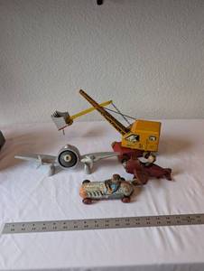 lot 56 image: Vintage Tin and Cast Metal Toy Collection including Mickeys Air Mail Plane, Crane, and Race Car