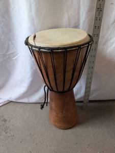 lot 59 image: Hand-Carved Wooden Djembe Drum with Bahamian Dolphin Motif