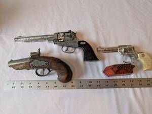 lot 133 image: Set of 3 Vintage Toy Cap Guns and Cast Iron Miniature Flat Iron